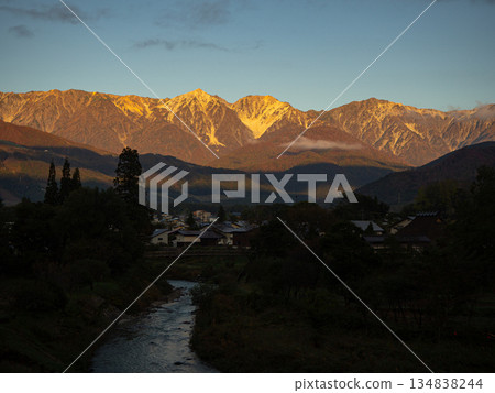 The Northern Alps appearing between the clouds in Hakuba Village, Nagano Prefecture The Northern Alps appearing between the clouds in Hakuba Village, Nagano Prefecture 134838244