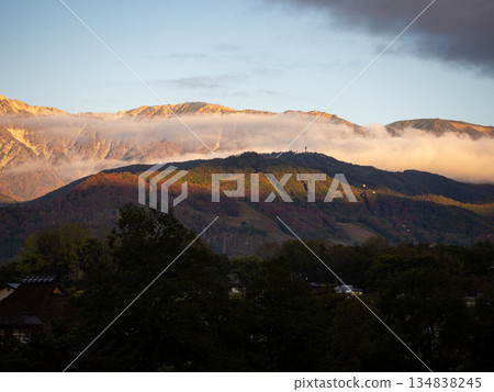 The Northern Alps appearing between the clouds in Hakuba Village, Nagano Prefecture The Northern Alps appearing between the clouds in Hakuba Village, Nagano Prefecture 134838245