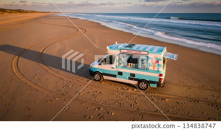 Ice Cream Truck On Sandy Beach With Ocean Waves Under Evening Sunlight 134838747