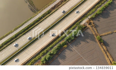 Aerial view of street in Bangkok Thailand with cars and countryside 134839011