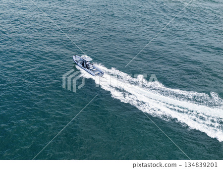 Luxury boat yachting. Motorboat sailing at sea. Luxury charter yacht in sea. Motor yacht luxury vessel. Sea motor boat. Sea summer vacation. Aerial motorboat. Yacht or sailboat tour Luxury boat yachting. Motorboat sailing at sea. Luxury charter yacht in sea. Motor yacht luxury vessel. Sea motor boat. Sea summer vacation. Aerial motorboat. Yacht or sailboat tour 134839201