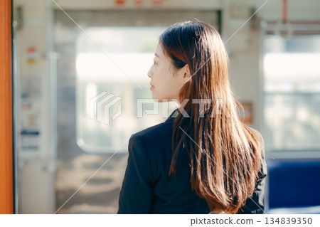Japanese female university student talking on smartphone 134839350