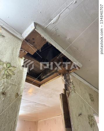 Opening in the ceiling where the chimney of the old heating stove was. Opening in the ceiling where the chimney of the old heating stove was. 134840707