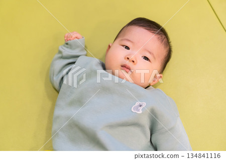 A Japanese baby boy playing in the kids' room of an apartment building 134841116