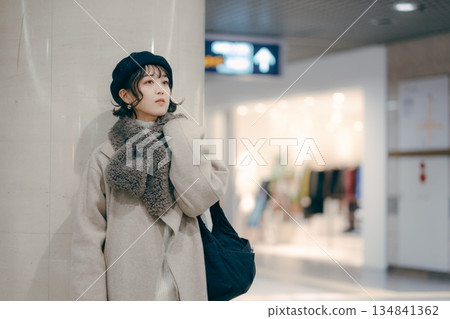 A woman in her 30s waiting for an appointment A woman in her 30s waiting for an appointment 134841362