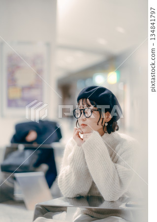 Portrait of a woman in her 30s waiting for an appointment Portrait of a woman in her 30s waiting for an appointment 134841797