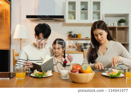 Family Asian spending happy time together on vacation, daughter homework on holiday. Family Asian spending happy time together on vacation, daughter homework on holiday. 134841977