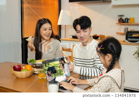 Family Asian spending happy time together on vacation, daughter homework on holiday. Family Asian spending happy time together on vacation, daughter homework on holiday. 134841978