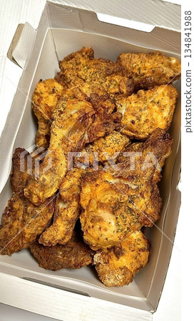 Crispy fried chicken with golden, crunchy skin and juicy, tender meat. A delicious and savory dish, perfect for any meal, served with dipping sauces or side dishes for extra flavor! Crispy fried chicken with golden, crunchy skin and juicy, tender meat. A delicious and savory dish, perfect for any meal, served with dipping sauces or side dishes for extra flavor! 134841988