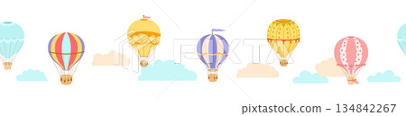Seamless vector border with hot air balloons in clouds, hand drawn repeating illustrations on white Seamless vector border with hot air balloons in clouds, hand drawn repeating illustrations on white 134842267