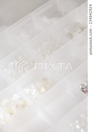 Natural loose stone set in a case for organization and storage. Rutilated quartz gemstones. Handmade. Natural loose stone set in a case for organization and storage. Rutilated quartz gemstones. Handmade. 134842924
