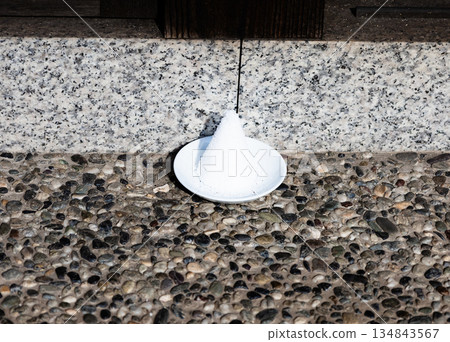 Purifying salt placed at the entrance 134843567