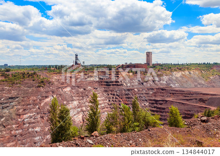 View of huge iron ore quarry in Kryvyi Rih, Ukraine. Open pit mining 134844017