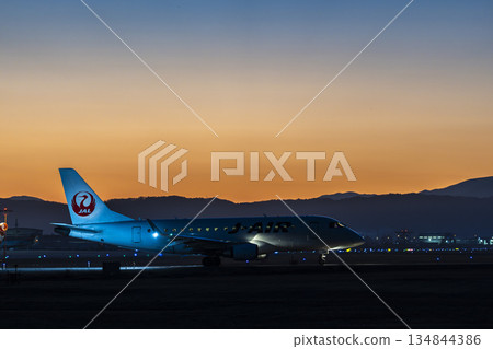 Sendai Airport at dusk, airplane taxiing, silhouette, Natori City, Miyagi Prefecture 134844386