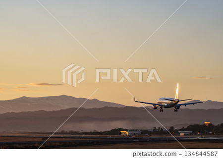 Sendai Airport at dusk, airplane landing, Natori City, Miyagi Prefecture 134844587