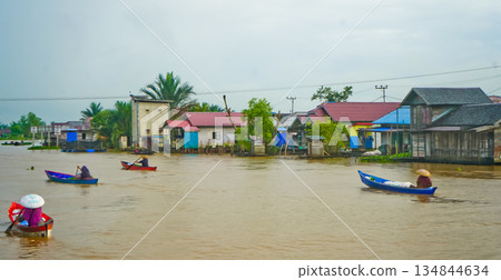Beautiful view of Mertapura River floating market, South Kalimantan, Indonesia 134844634