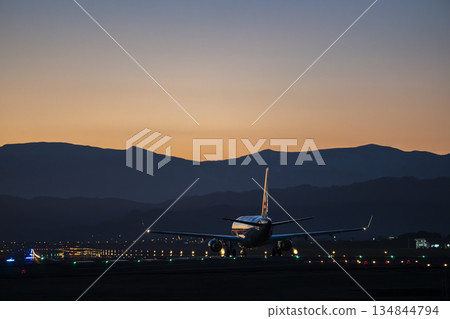 Sendai Airport at dusk, airplane taking off, Natori City, Miyagi Prefecture 134844794