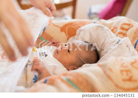 Japanese baby boy sleeping in a crib Japanese baby boy sleeping in a crib 134845131
