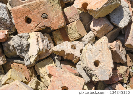 Construction debris from broken bricks close up Construction debris from broken bricks close up 134845330