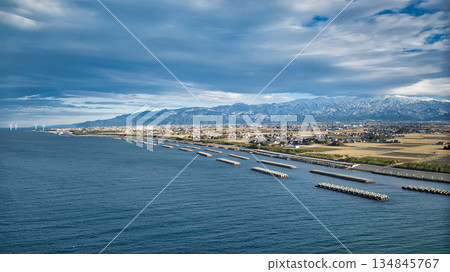 A winter view of the Kurobe River alluvial fan from the coastline of the Sea of Japan A winter view of the Kurobe River alluvial fan from the coastline of the Sea of Japan 134845767