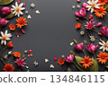 Flowers on dark background with copy space. Floral frame 134846115