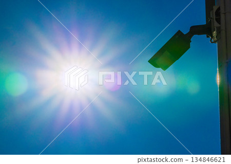 Yokohama cityscape in Japan. Security cameras on street corners. Year-end... Security cameras bathed in sunlight. Increasing needs... Yokohama cityscape in Japan. Security cameras on street corners. Year-end... Security cameras bathed in sunlight. Increasing needs... 134846621