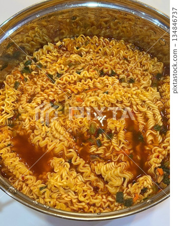 Shin Ramyun,close up of Ramyeon or Ramyun is a Korean-style soup noodle dish with a spicy flavor. Ramyeon or Korean instant noodles with egg - Korean food style 134846737