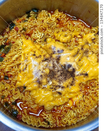 Shin Ramyun,close up of Ramyeon or Ramyun is a Korean-style soup noodle dish with a spicy flavor. Ramyeon or Korean instant noodles with egg - Korean food style 134847170