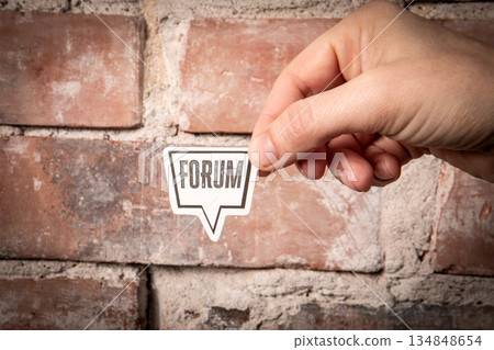 FORUM Community Discussion Concept With Hand Holding Speech Bubble Sign 134848654