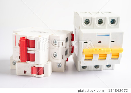 Automatic circuit breaker on white background, control and protect electrical power system. Automatic circuit breaker on white background, control and protect electrical power system. 134848672
