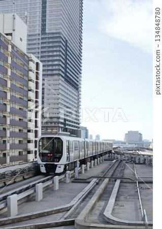 Yurikamome Line running near Toyosu Station 134848780