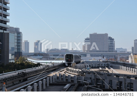 Yurikamome Line running near Toyosu Station 134848781