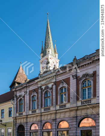 Clock Tower Spire Rising Above Historic Town Hall Facade Medias 134848875