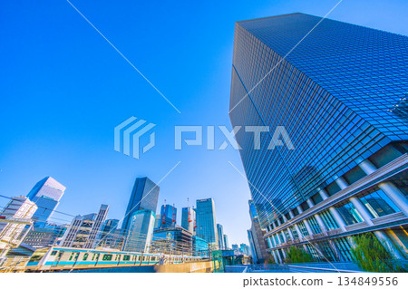 New landscape of Tokyo cityscape in Japan, including Otemachi Place, huge steel structure, trains, and buildings in front of Tokyo Station New landscape of Tokyo cityscape in Japan, including Otemachi Place, huge steel structure, trains, and buildings in front of Tokyo Station 134849556