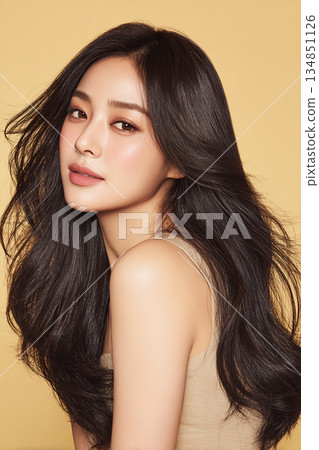 Hairstyle catalog for beauty salons, glossy long black hair, feminine beauty 134851126