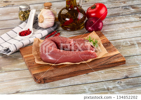 Raw pork tenderloin for cooking Raw pork tenderloin for cooking 134852202