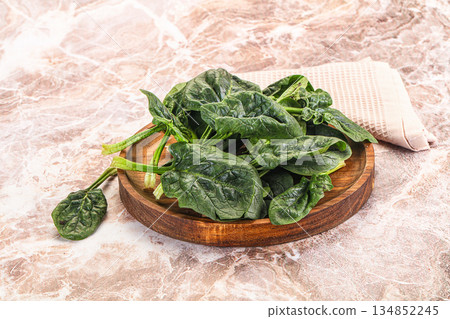 Fresh green spinach leaves heap Fresh green spinach leaves heap 134852245