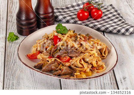 Asian udon noodles with beef Asian udon noodles with beef 134852316