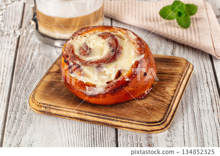 Glazed cinnabon swirl with icing Glazed cinnabon swirl with icing 134852325