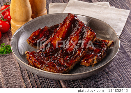 Grilled pork ribs with barbecue sauce Grilled pork ribs with barbecue sauce 134852443