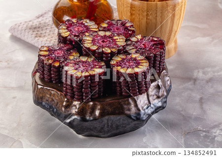 Ripe boiled black corn garnish Ripe boiled black corn garnish 134852491