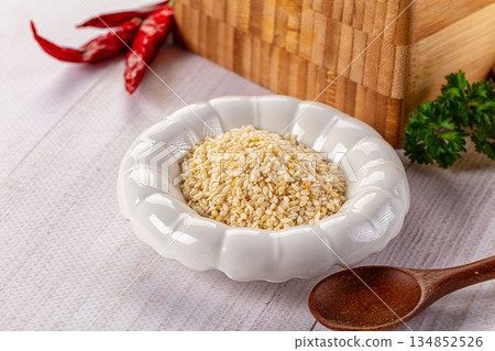 Raw dry sesame seeds heap Raw dry sesame seeds heap 134852526