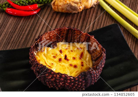 Baked sea urchin with cheese and egg 134852605
