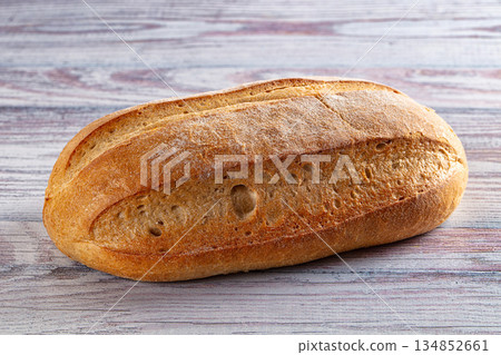 Rustic crusty brown loaf bread Rustic crusty brown loaf bread 134852661
