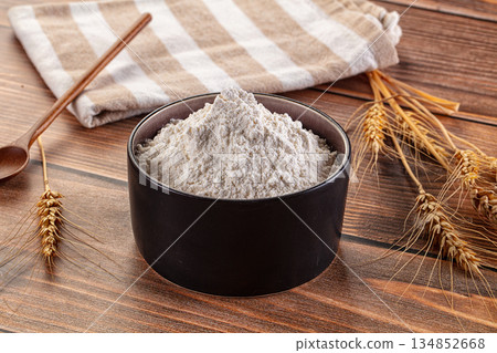 White flour powder in the bowl White flour powder in the bowl 134852668
