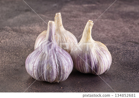 Ripe garlic heap for cooking Ripe garlic heap for cooking 134852681