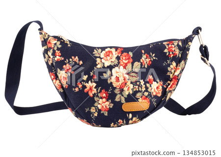Navy blue floral patterned bag isolated on white background Navy blue floral patterned bag isolated on white background 134853015