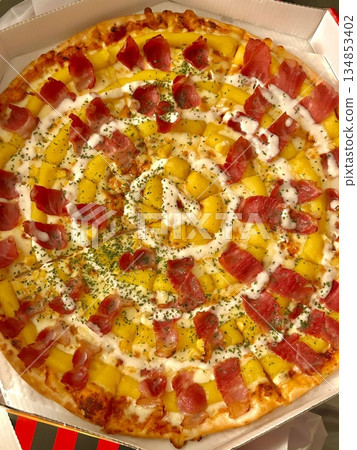 Delicious slice of pizza with a crispy crust, gooey melted cheese, and flavorful toppings. Perfect for a quick snack, party treat, or satisfying meal. Irresistibly cheesy and full of flavor! 134853402