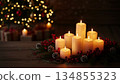 Warm Christmas Candles and Festive Lights Create a Cozy Holiday Atmosphere 134855323