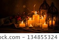 Warm Glow of Candles and Lanterns Creating a Cozy Ambiance 134855324